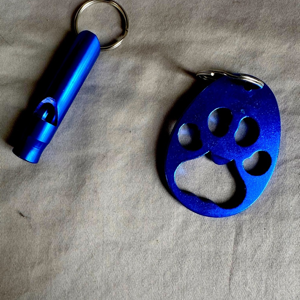 2 whistles & 2 dog print key chains